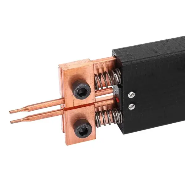 Close-up view of the Gopimer Spot Welding Gun’s copper electrodes welding a nickel strip onto a 18650 lithium battery.